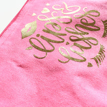 Load image into Gallery viewer, It&#39;s all about the lips and lashes!  Made from 100% cotton canvas, these pretty fuschia pink toiletry / make up bags with zip closing have a waterproof lining and gold foil design.  Dimensions: 15 x 27 x 7 cm
